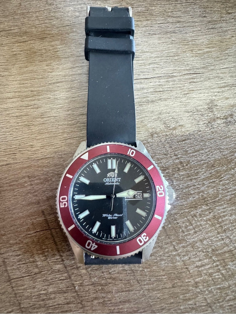 Orient Automatic Dive Watch with Black Dial and Red Bezel